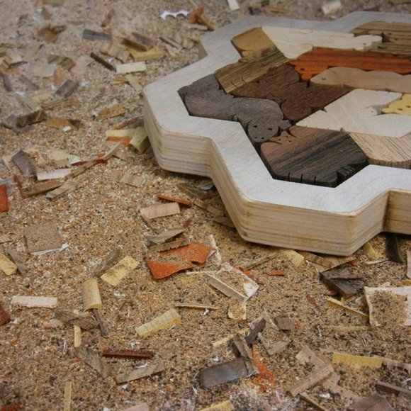 Wooden puzzle snowflake frame